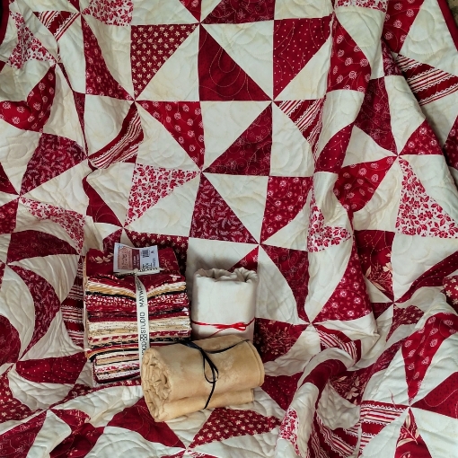 A beautiful Quilt to create with a Fat Quarter Bundle of In Stitches ...
